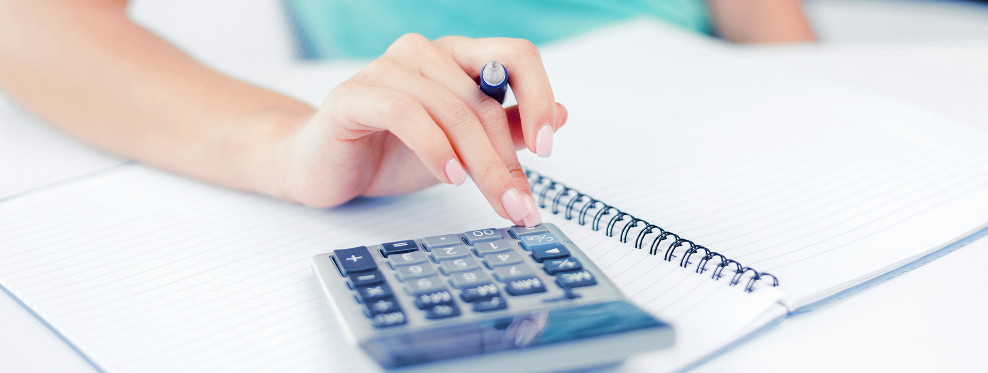 Mortgage Calculator page featured image - woman using calculator